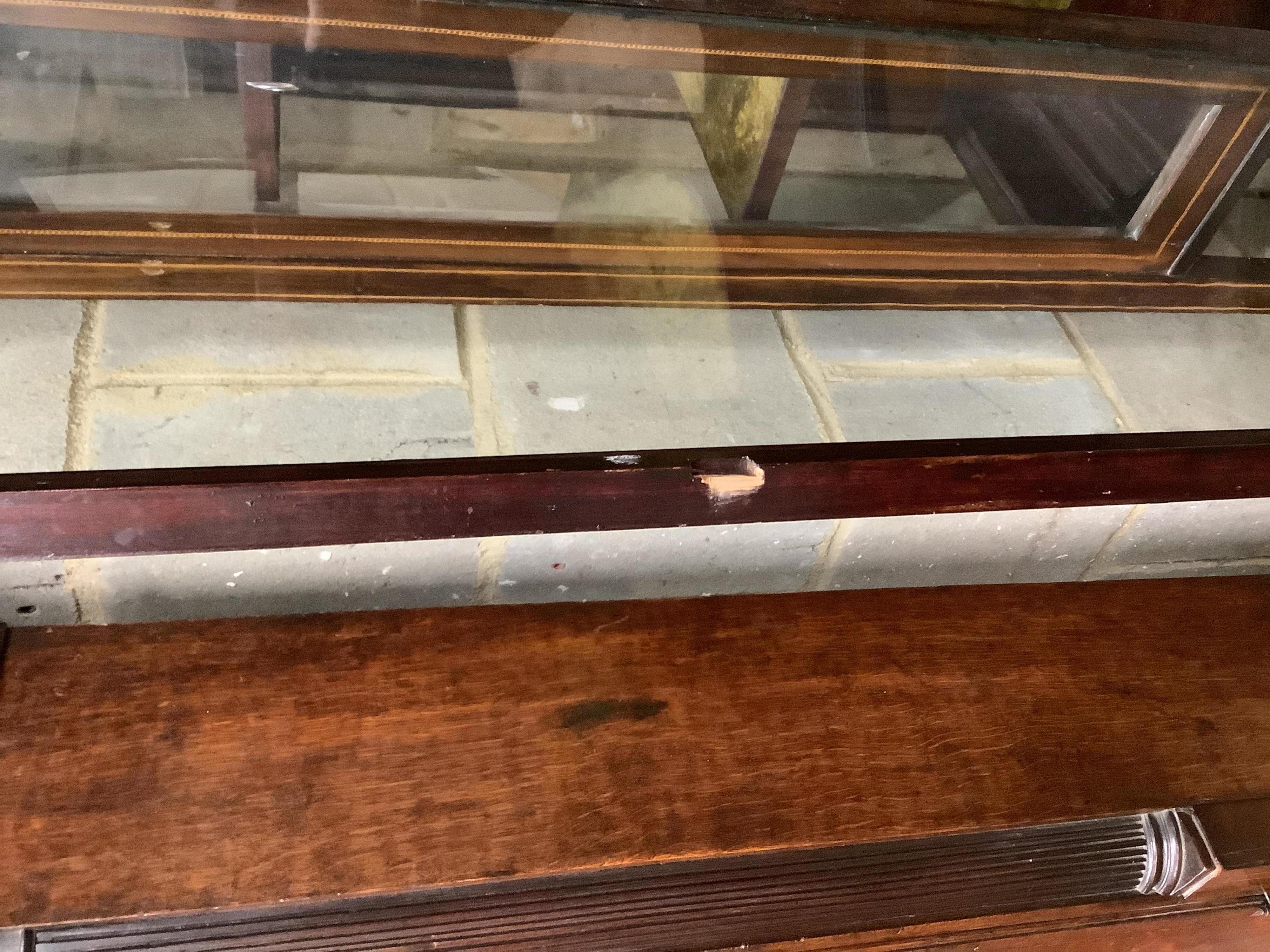 An Edwardian inlaid mahogany bow-fronted display cabinet, width 91cm, depth 40cm, height 166cm